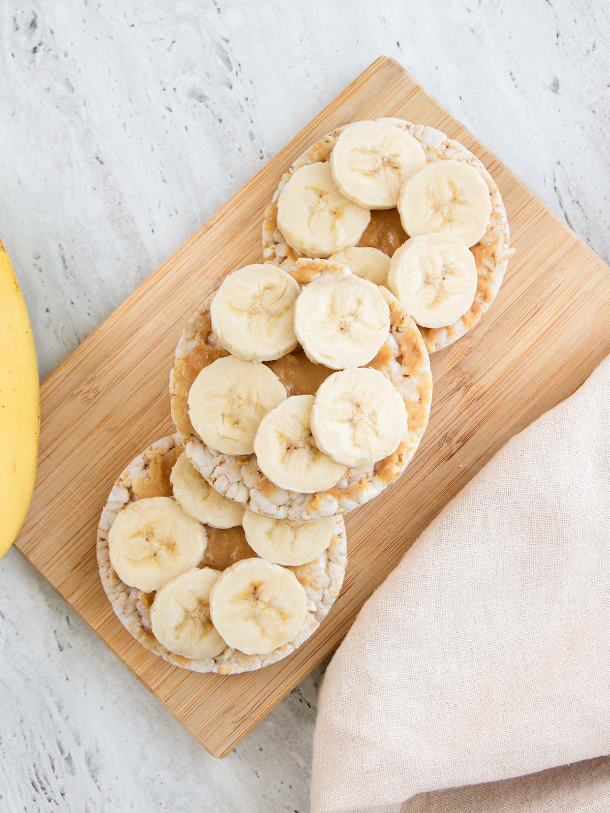 trapuciai-kremas-bananas Trapučiai su riešutų kremu ir bananu.